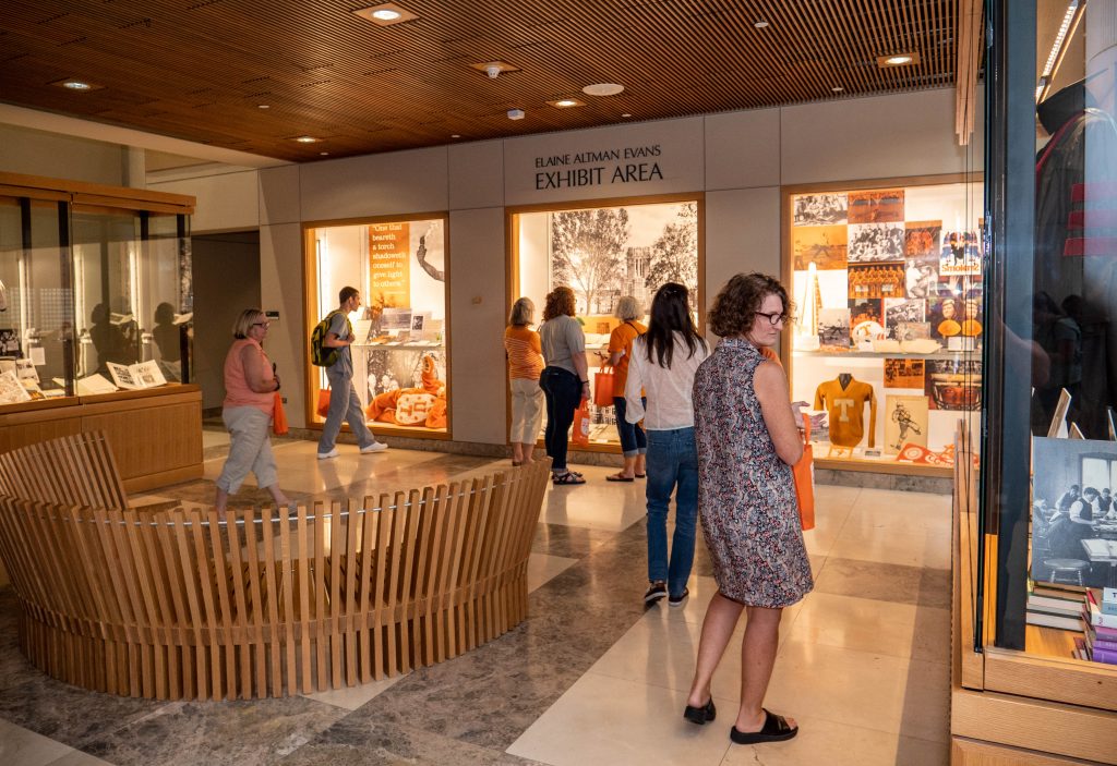 People browsing the Elaine Altman Evans Exhibit Area