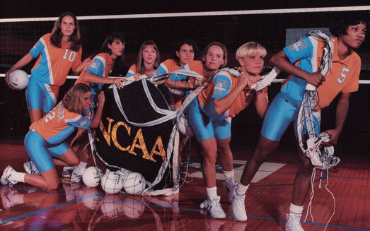 Lady Vols Volleyball team members pose on the court