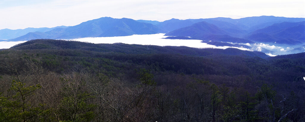 Thermal inversion, 55° on the peaks and 40° in the valley, looking toward Mount Le Conte, December 1974 