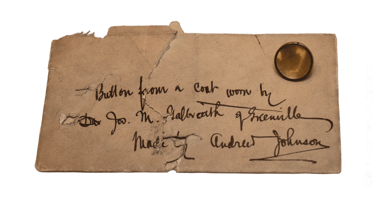 button pinned to card reading "button from coat made by Andrew Johnson"
