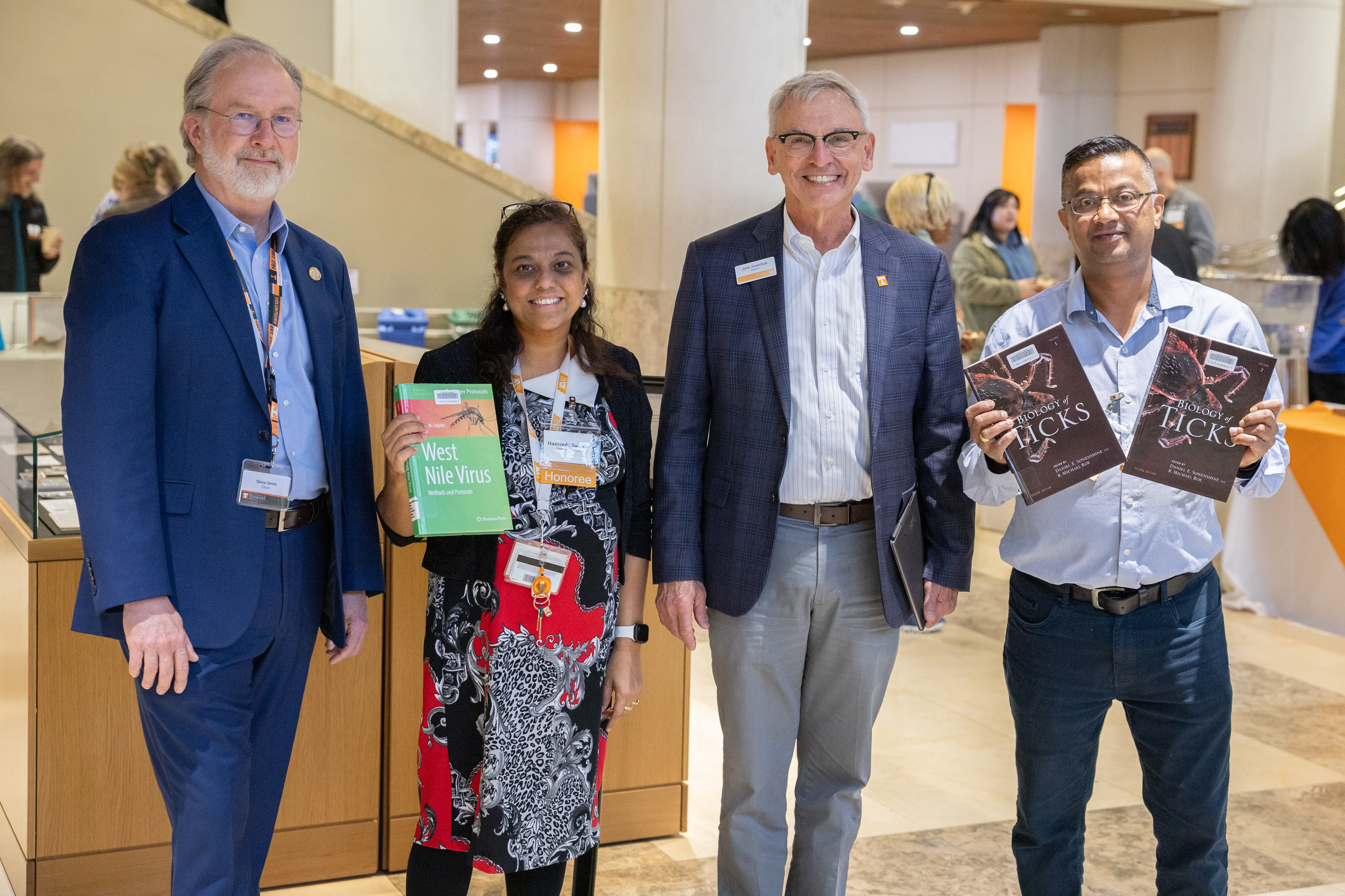 At the 2025 Faculty Bookplate Reception: Steve Smith, Dean of Libraries; Hameeda Sultana, professor of Biomedical and Diagnostic Sciences; John Zomchick, Provost; Girish Neelakanta, professor of Biomedical and Diagnostic Sciences.  