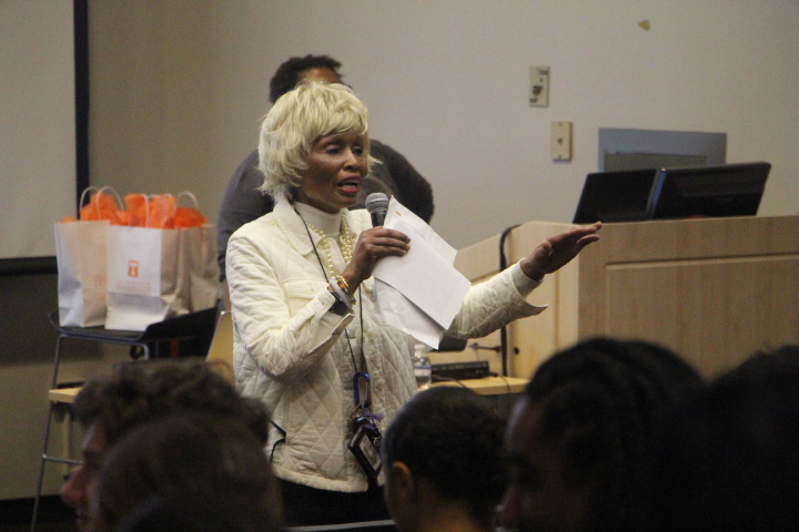 Librarian Thura Mack welcomes BOSS attendees.