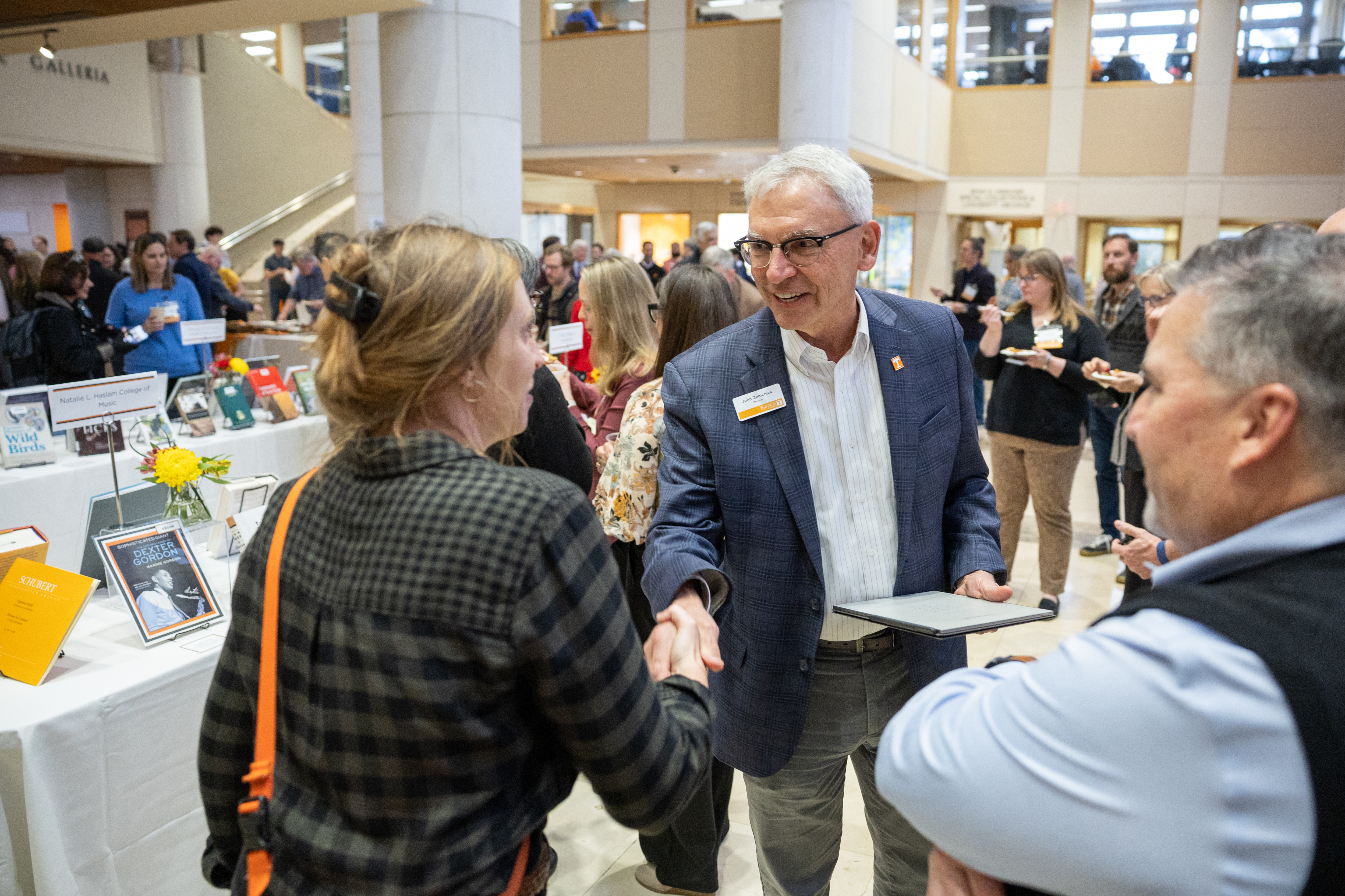 Provost John Zomchick greets faculty honorees at the 2025 Faculty Bookplate Reception. 